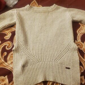 Tom's sweater